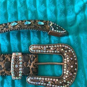 One GORGEOUS leather belt TOTALLY EMBELLISHED 51” long. Max 47 waist- min 40”